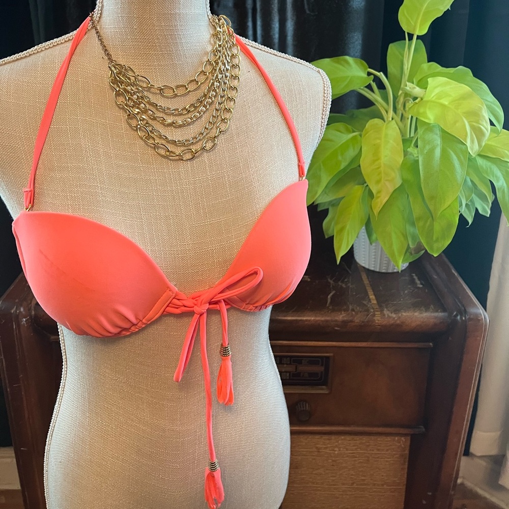 Neon pastel pink swimsuit top super cute and straps can be worn off or on.